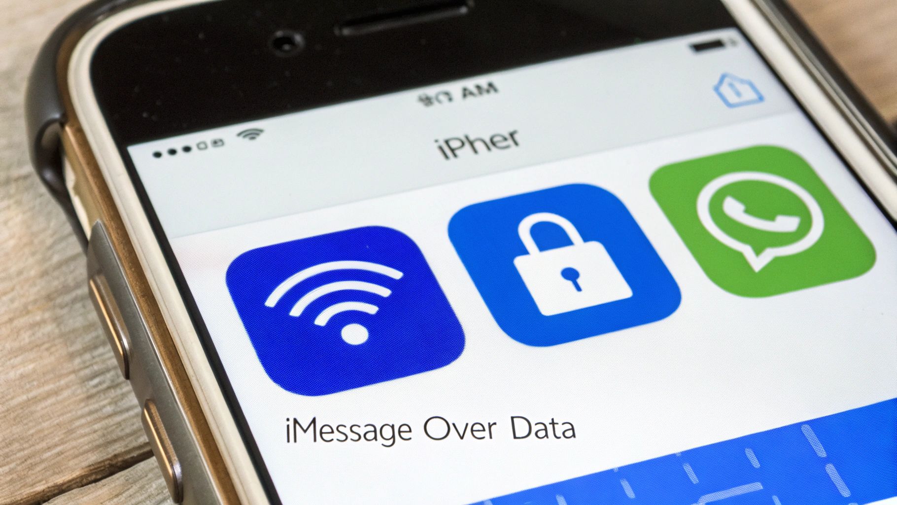Close-up of an iPhone screen displaying the 'iPher' app with icons for Wi-Fi, a lock, and WhatsApp, along with the text 'iMessage Over Data'.